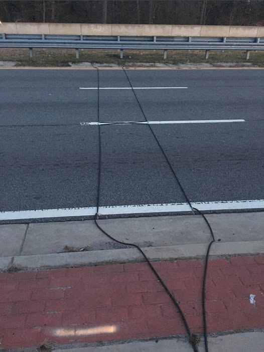 What You Should Do When You See Black Cables on the Road