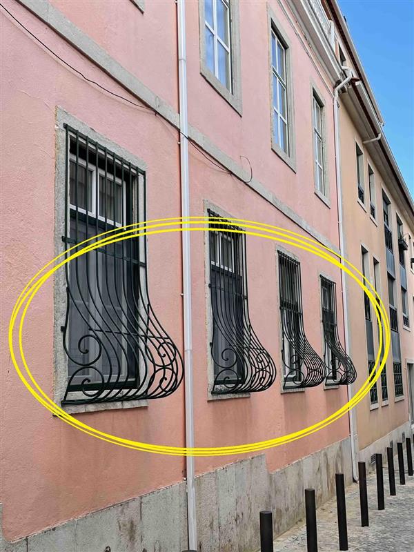 Window grills that curve at the bottom reveal something—here’s what