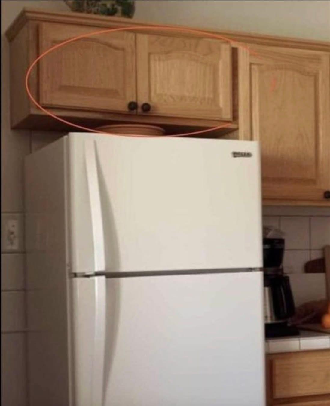 Here’s What the Cupboards Above Your Fridge Are Really For – And Why Most People Use Them Wrong